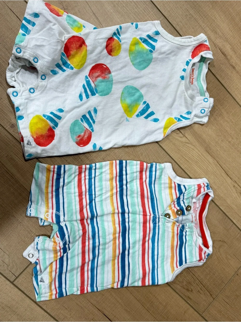 Burt's Bees Baby White Romper with Teal Trim & Blue Snap Accents